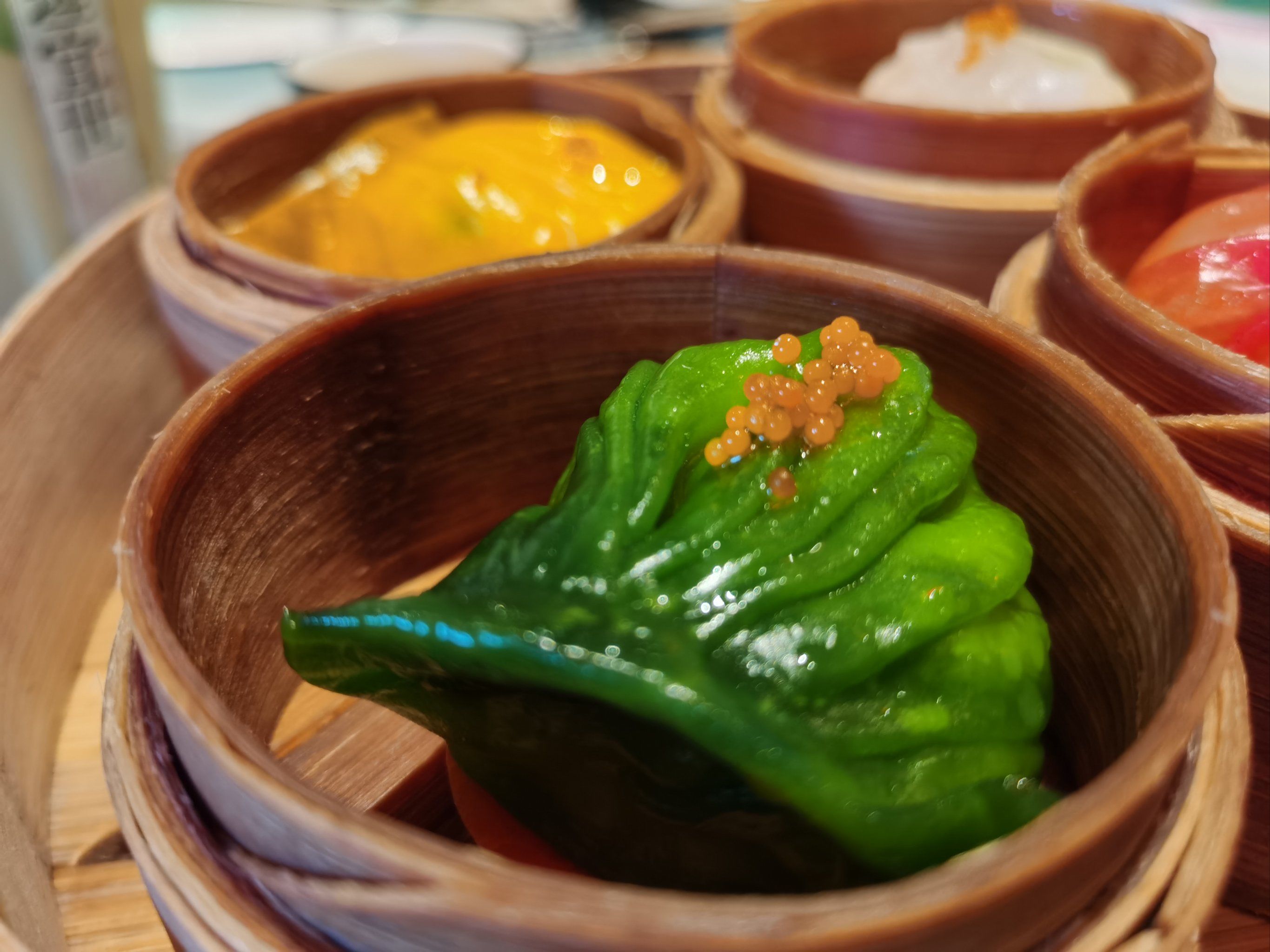 江西特色绿色的像饺子(江西清明节吃的绿色饺子)