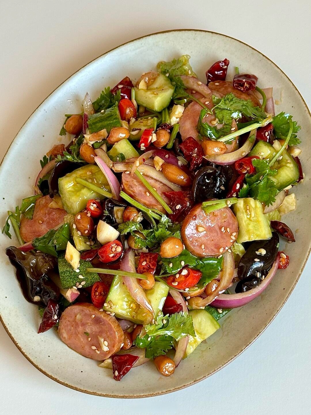 黄瓜芹菜怎么拌凉菜(芹菜拌黄瓜对身体有什么好处)