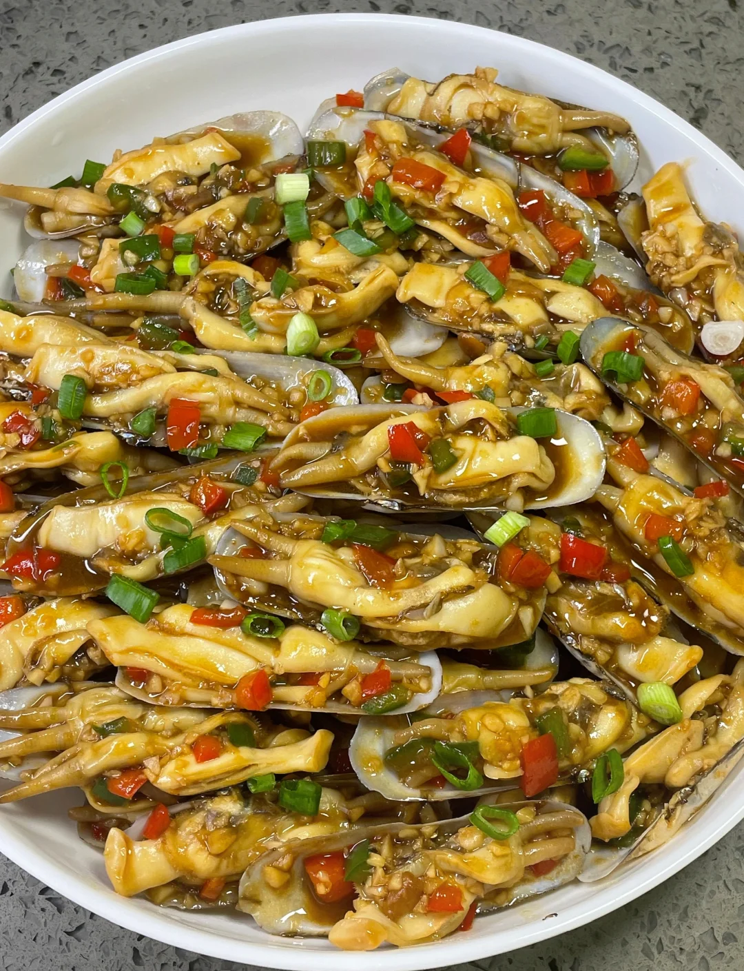 葱油蛏子的家常做法(蛏子怎么清理内脏视频)