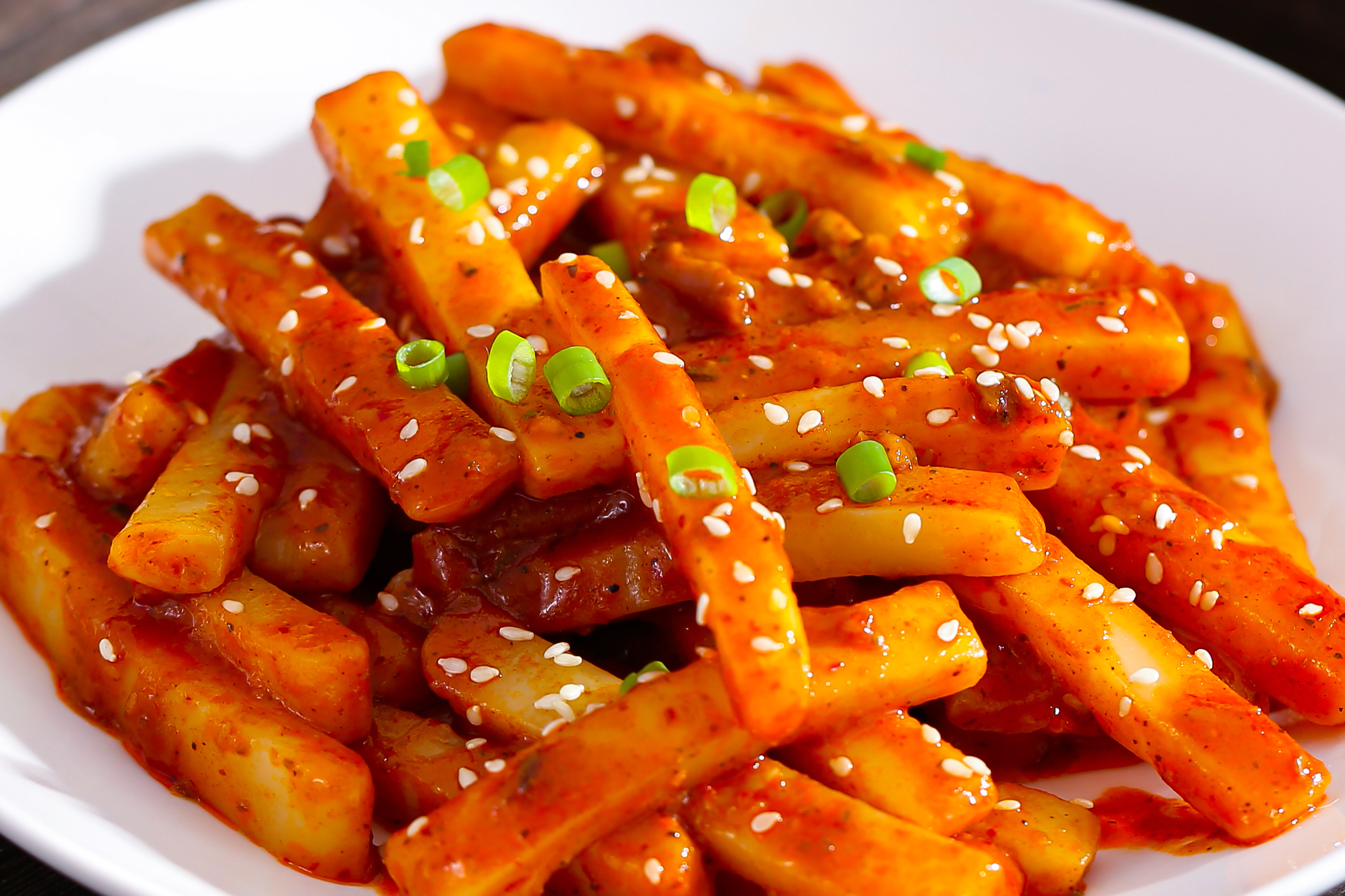 铁板甜辣年糕小吃(铁板炒年糕的做法窍门)