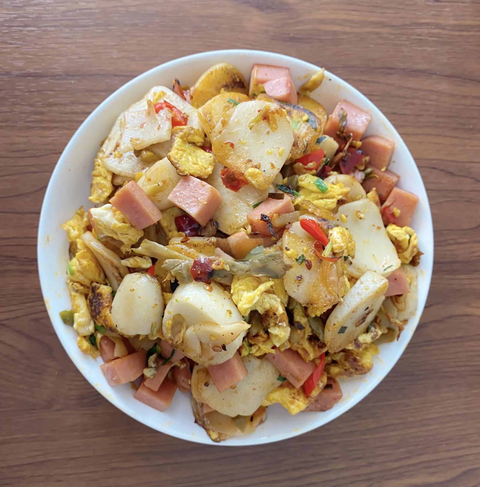 炒年糕小吃做法(炒年糕小吃做法大全)