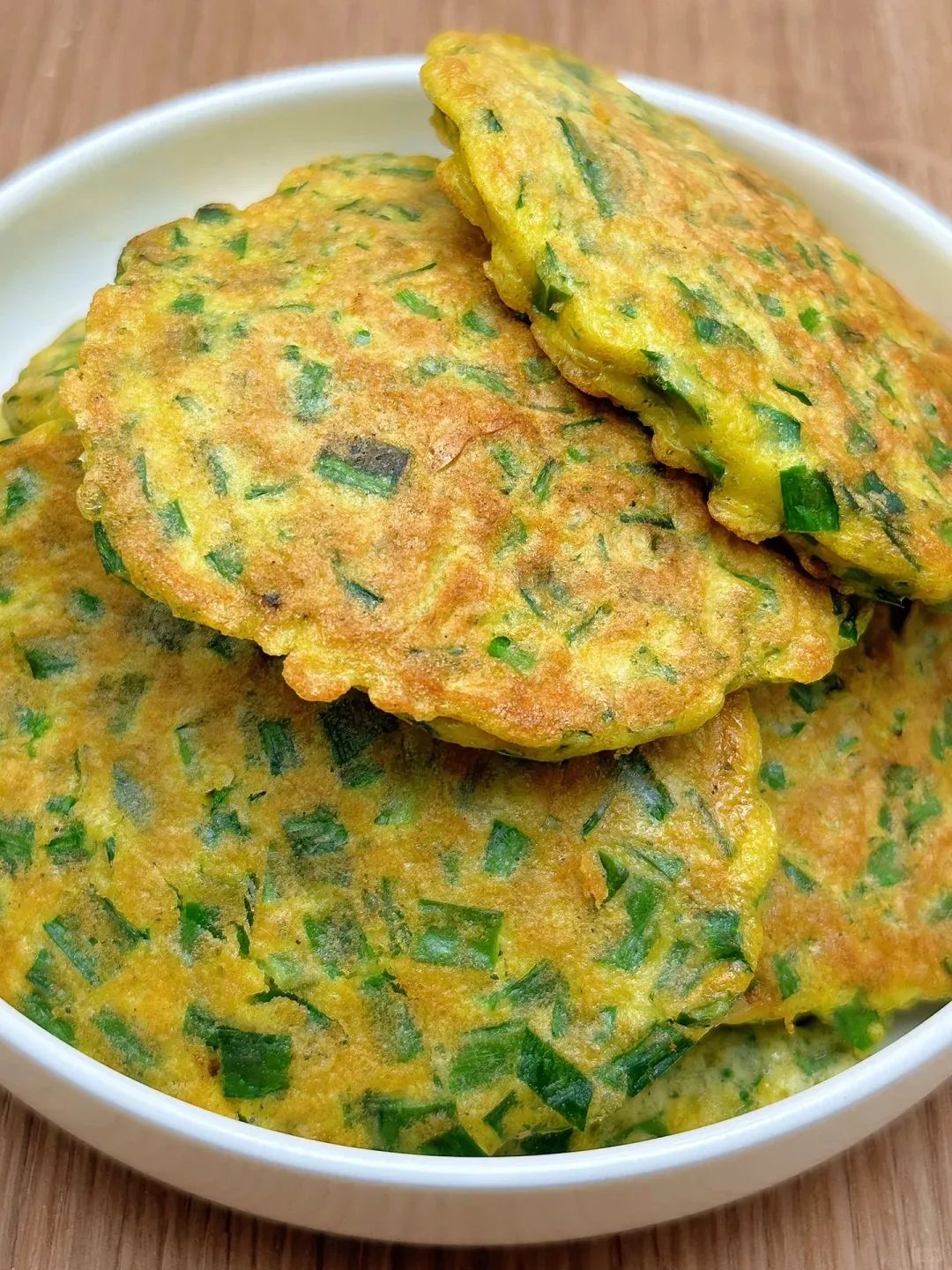 早餐吃韭菜饼(早餐吃韭菜饼喝黑米粥有啥好处)