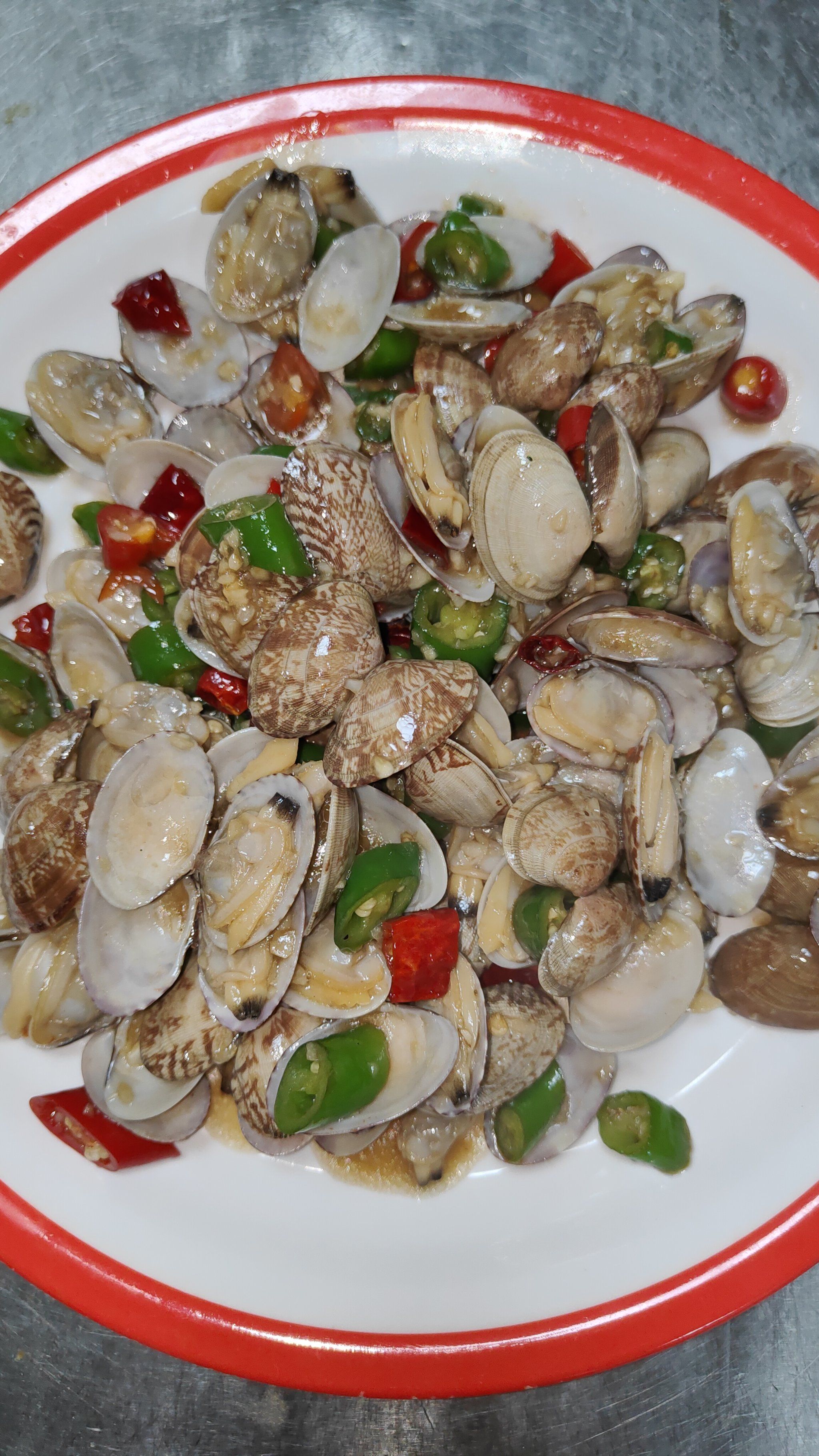 爆炒花甲特色(爆炒花甲的做法视频教程)