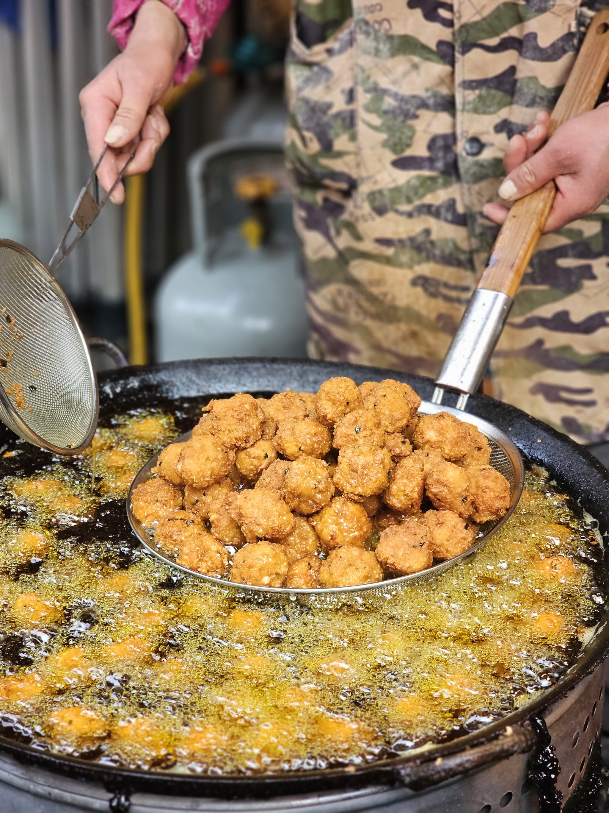 街头炸圆筒小吃(街头炸圆筒小吃店)