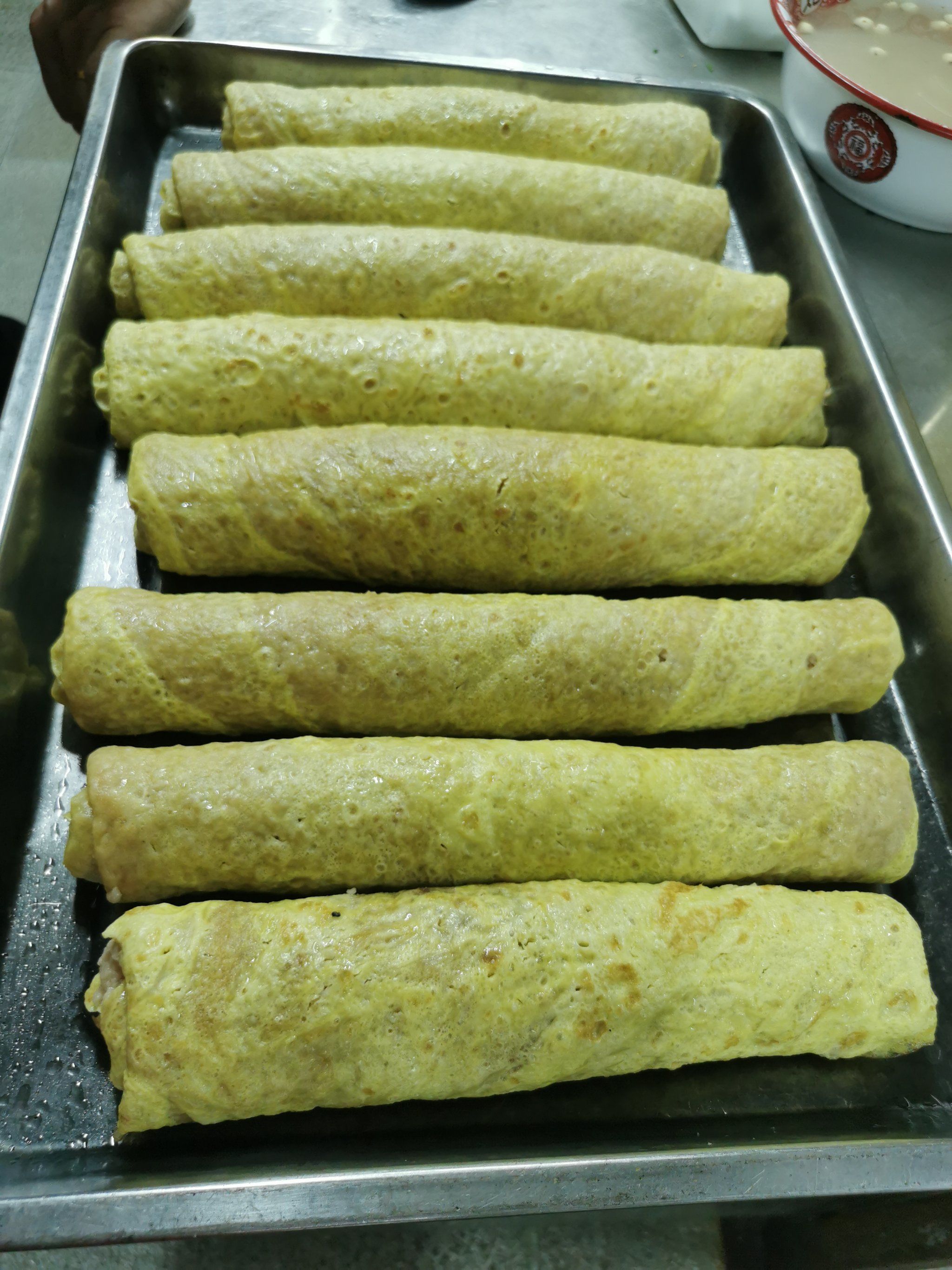 蛋皮卷小吃(蛋皮卷肉的做法视频)